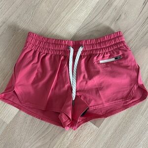 Vuori Women's Athletic Shorts in Pink